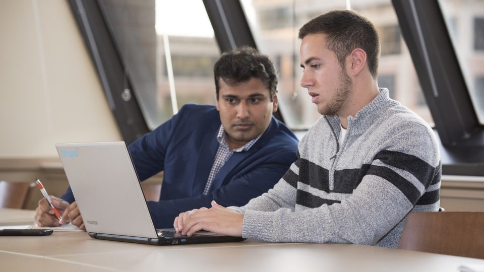 Syracuse Campus student and professor