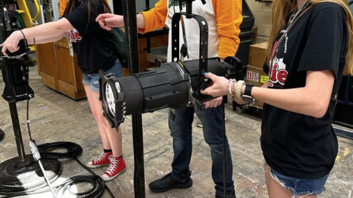 Students working on stage lighting