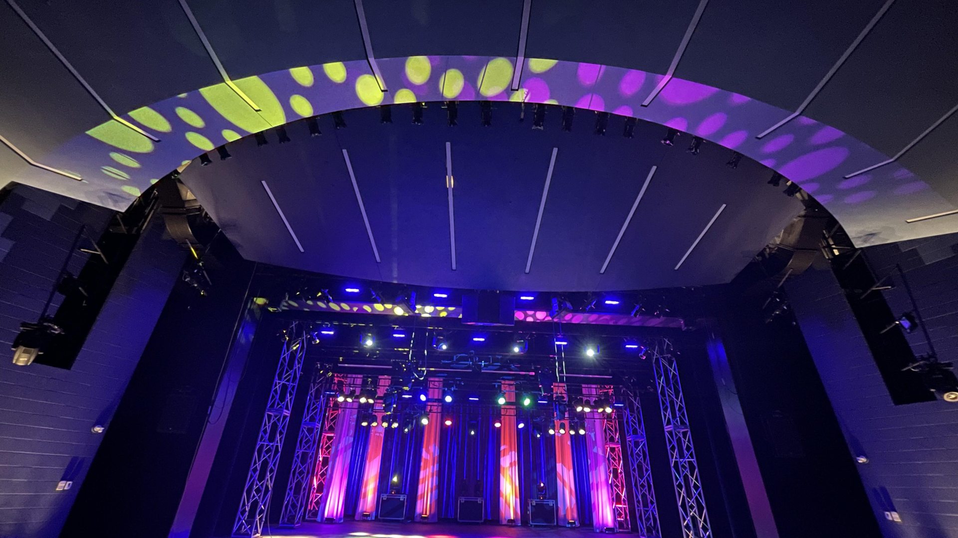 waterman theatre stage with colorful spot lights