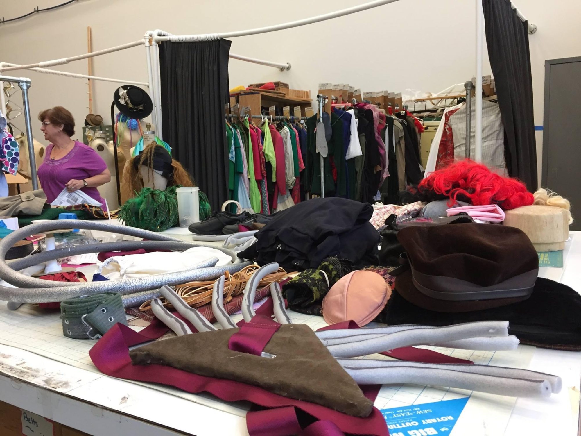 image of table filled with costume making materials