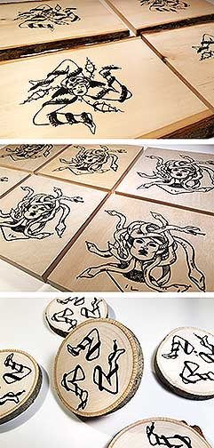 A series of wood prints featuring black ink and abstracted patterns.