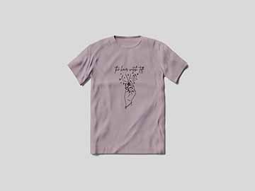 dark maroon t-shirt that features The Hair Witch Tiff logo that has a hand holding a pair of shears, surrounded by stars, a moon + a crystal 