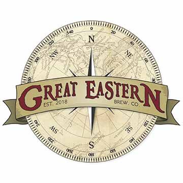 This is a circular logo with a banner wrapped around the middle.  The banner says “Great Eastern Brew. Co., Est. 2018.  The circle behind the banner is a compass whose background is an overlay of an old sailing map, and at the center is a star shape.