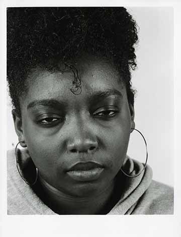 Portrait of a woman with an expression of annoyance, tiredness and depression. 