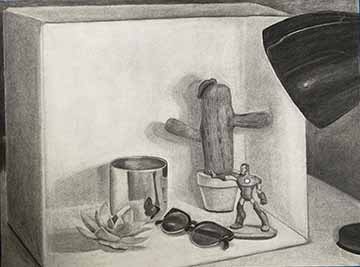 This is a grey scale drawing of a box turned on its side on the table. Inside the table there is (from left to right) a small ceramic succulent, a candle with a reflective surface, sunglasses, a plush cactus, and a small Iron Man toy. On the left side of the drawing you can see the edge of the head of a lamp, facing the box.