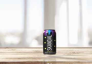 Skandal is based on the candy Skittles. It is not candy but an alcoholic beverage. Our packages that we created incorporated parts of the Skittle packaging. The label and box is black with the rainbow dripping down from the top of the can. On each label depending on the flavor there are mini skittles in the color of the flavor, for one there are red skittles representing the strawberry flavor.